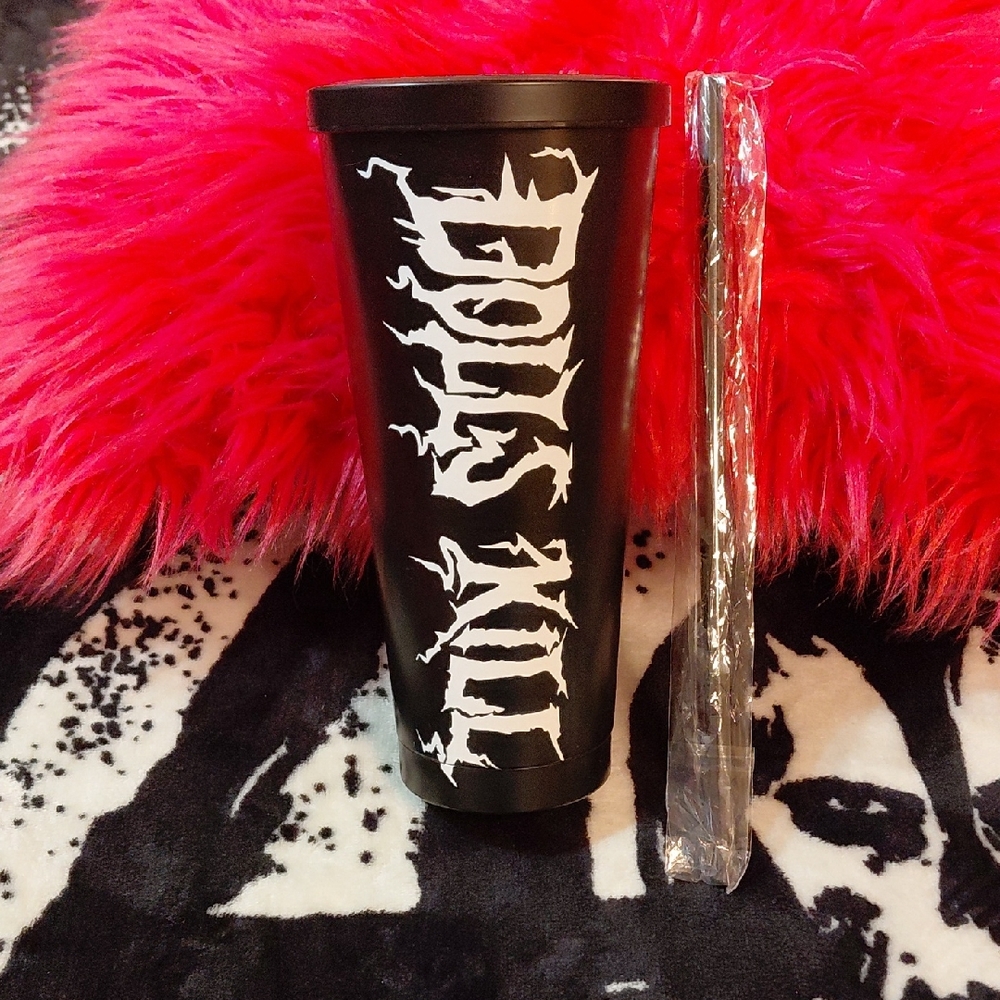 DOLLSKILL BLACK WITH WITH DOLLSKILL LETTERING HAS A SCREW ON TOP AND STRAW